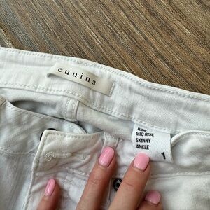 Size 1 distressed, white denim jean